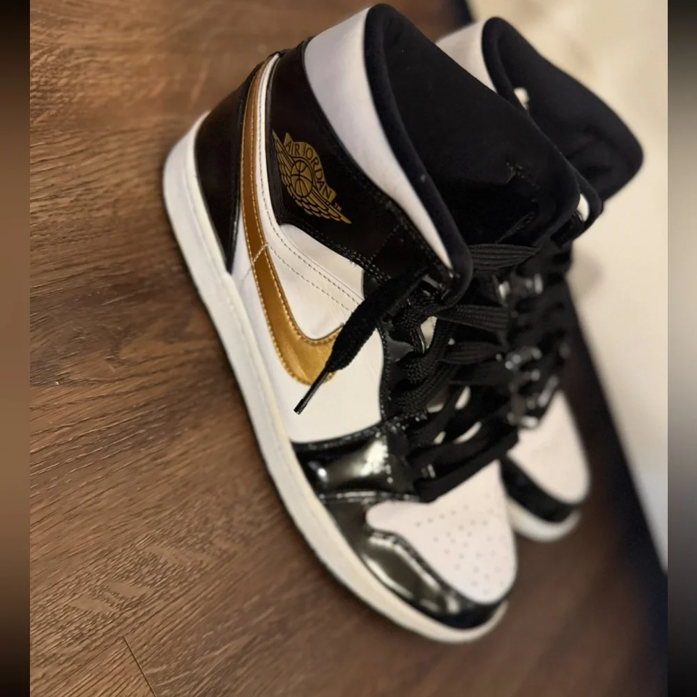 Jordan 1’s Black and Gold High-Top Sneakers